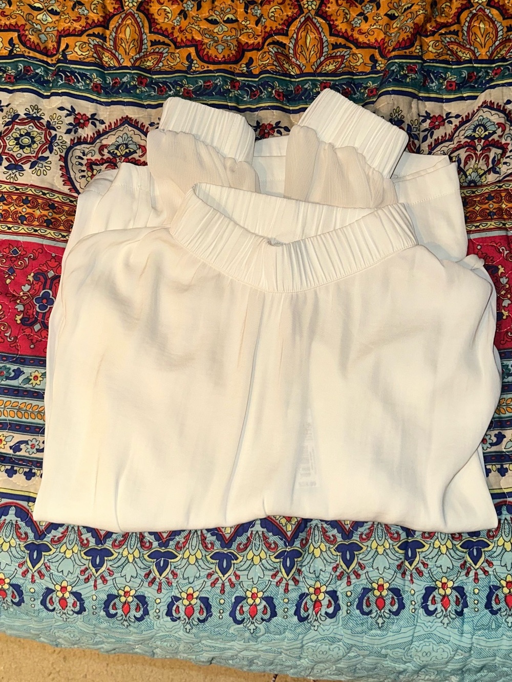 Women's White sheer Blouse with cinched neck and sleeves.